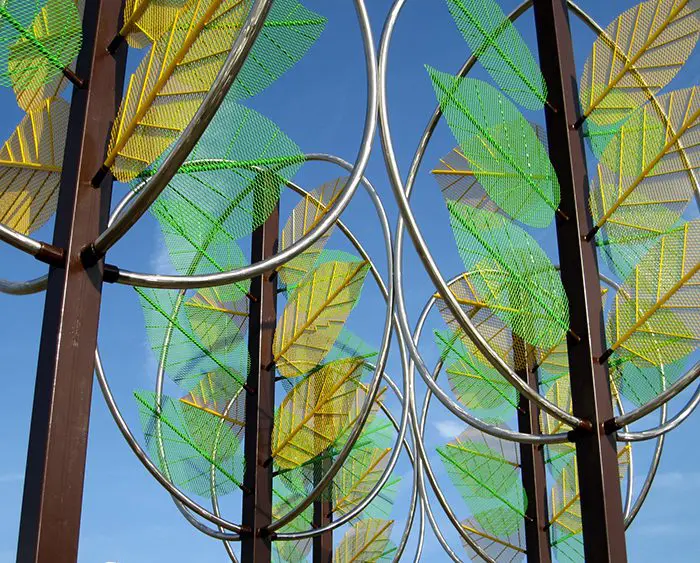 A close up of leaves on the side of a building